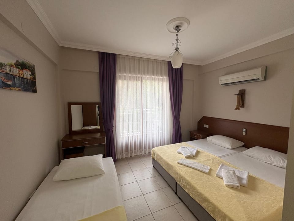 Photo of the whole room, Bedroom, towels, air conditioner