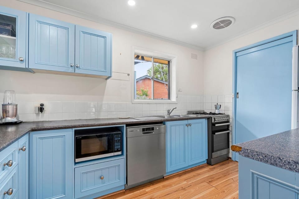 Kitchen or kitchenette, dishwasher, oven, stove