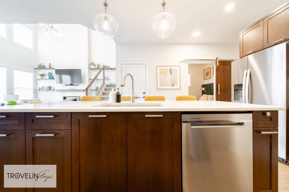 Kitchen or kitchenette, dishwasher, oven, stove