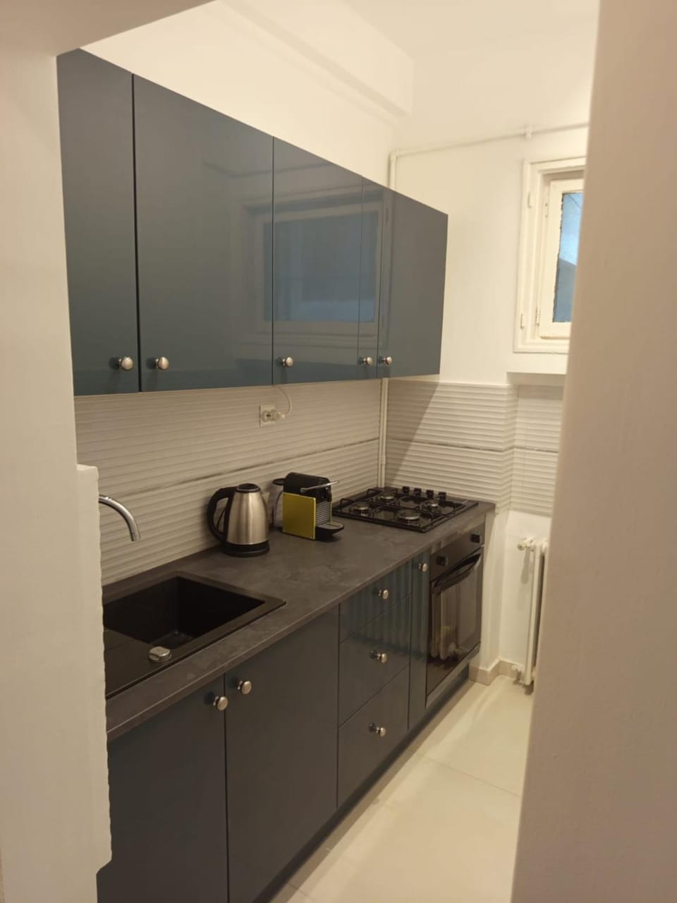 Kitchen or kitchenette, stove