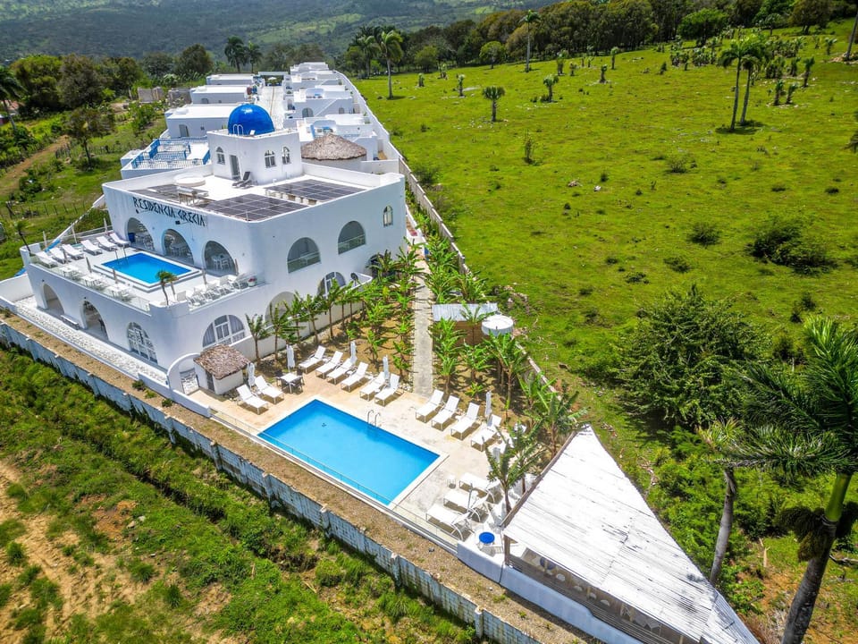 Property building, Day, Natural landscape, City view, Mountain view, Pool view, Swimming pool, Swimming pool, sunbed