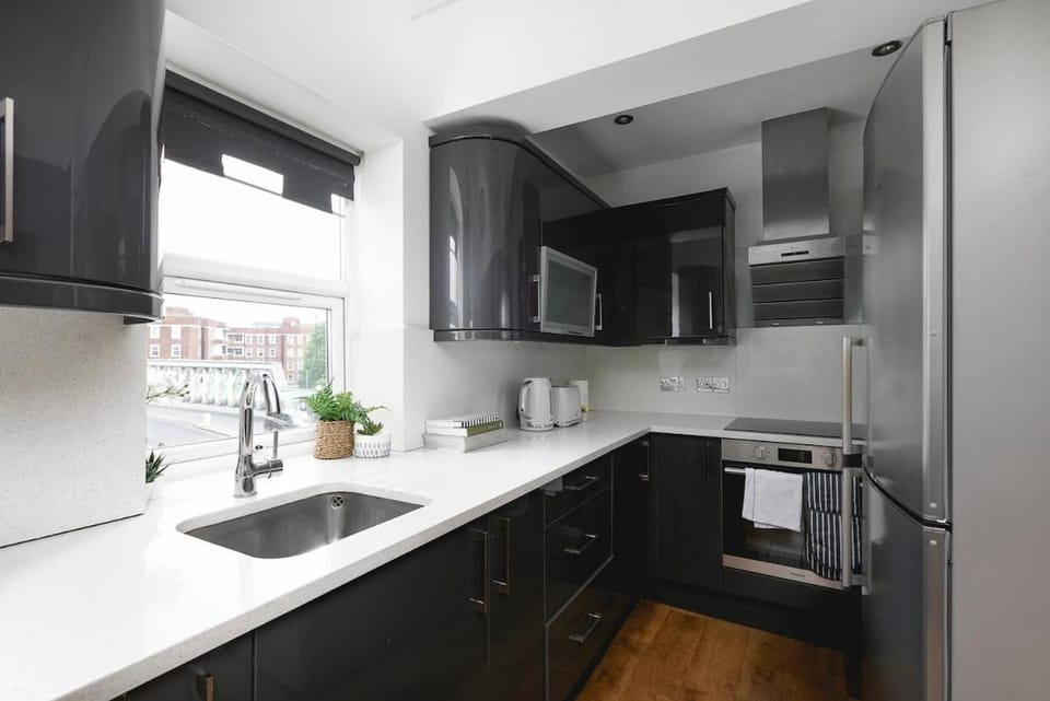 Kitchen or kitchenette, oven, stove, toaster