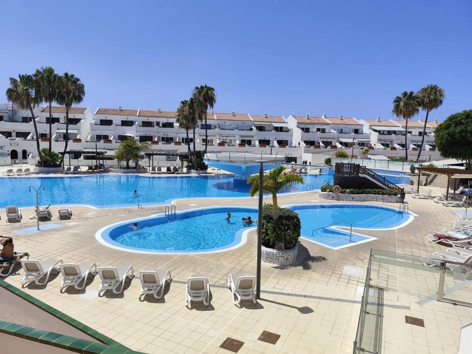 Property building, Living room, Swimming pool