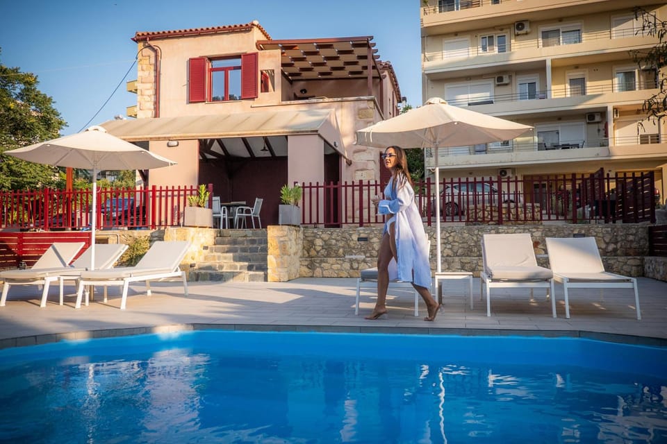 Property building, Patio, Day, People, View (from property/room), Balcony/Terrace, Guests, Pool view, Swimming pool, Swimming pool, group of guests, sunbed