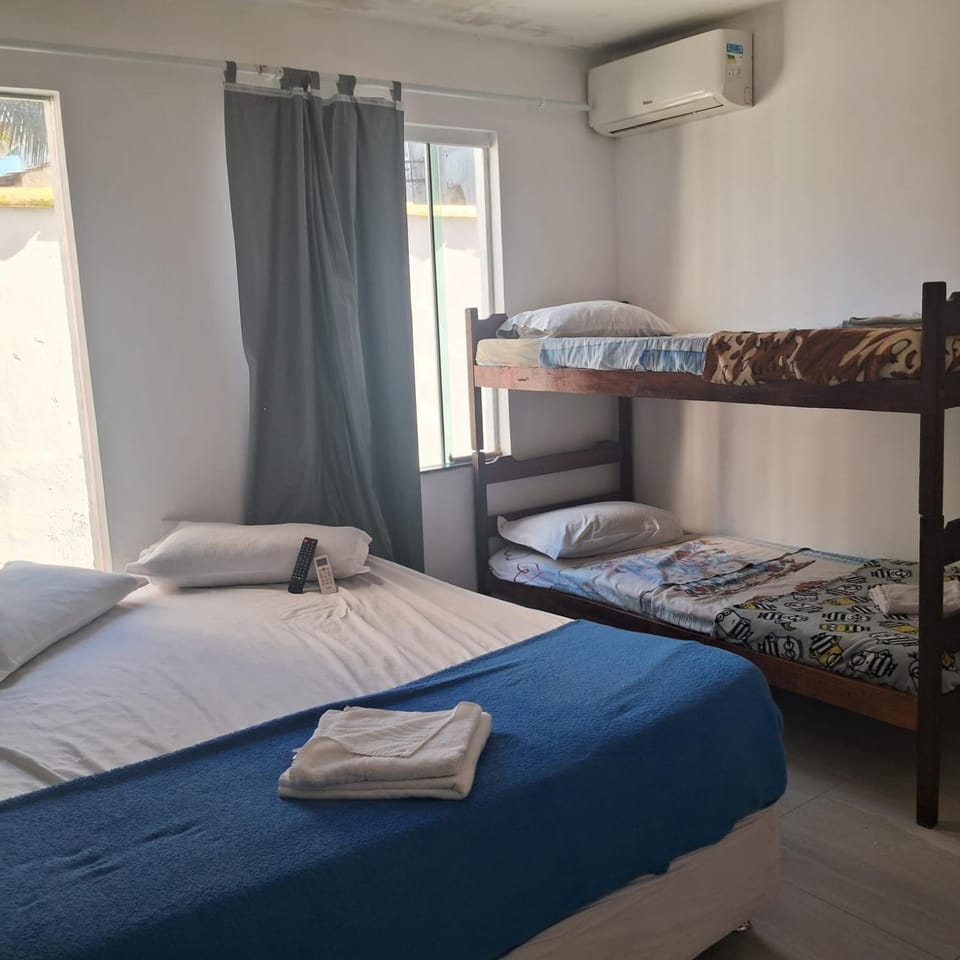 Bed, Photo of the whole room, Bedroom, bunk bed, towels, air conditioner