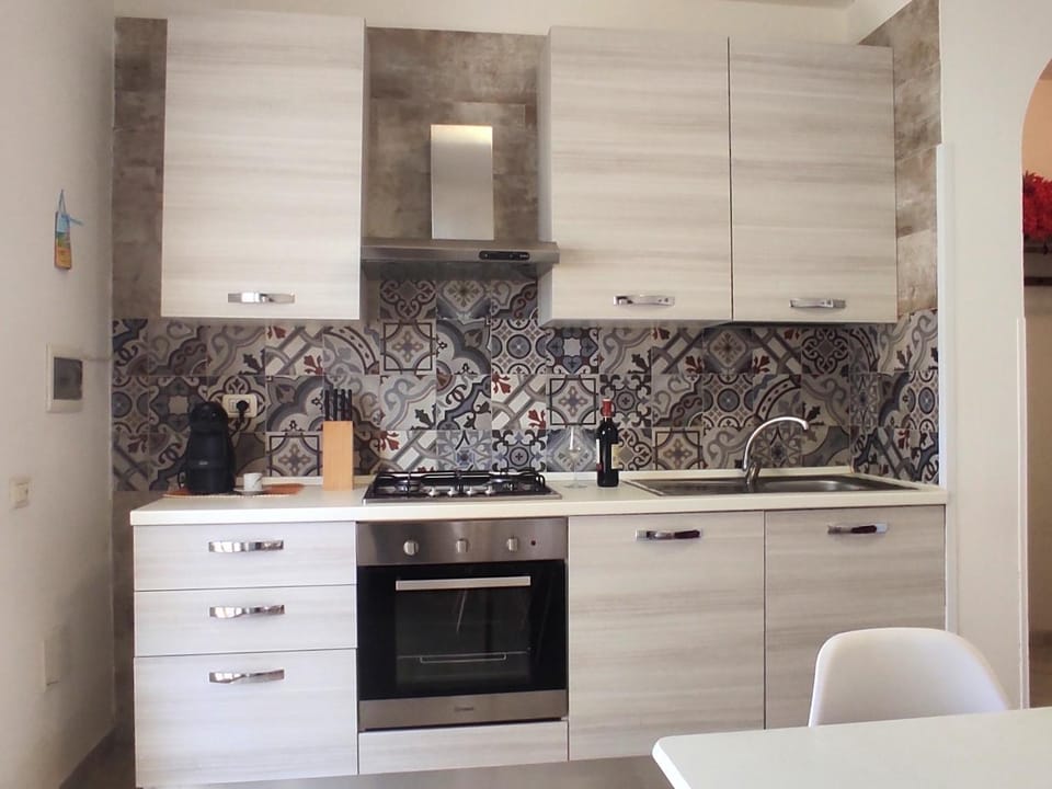 Kitchen or kitchenette, oven, stove