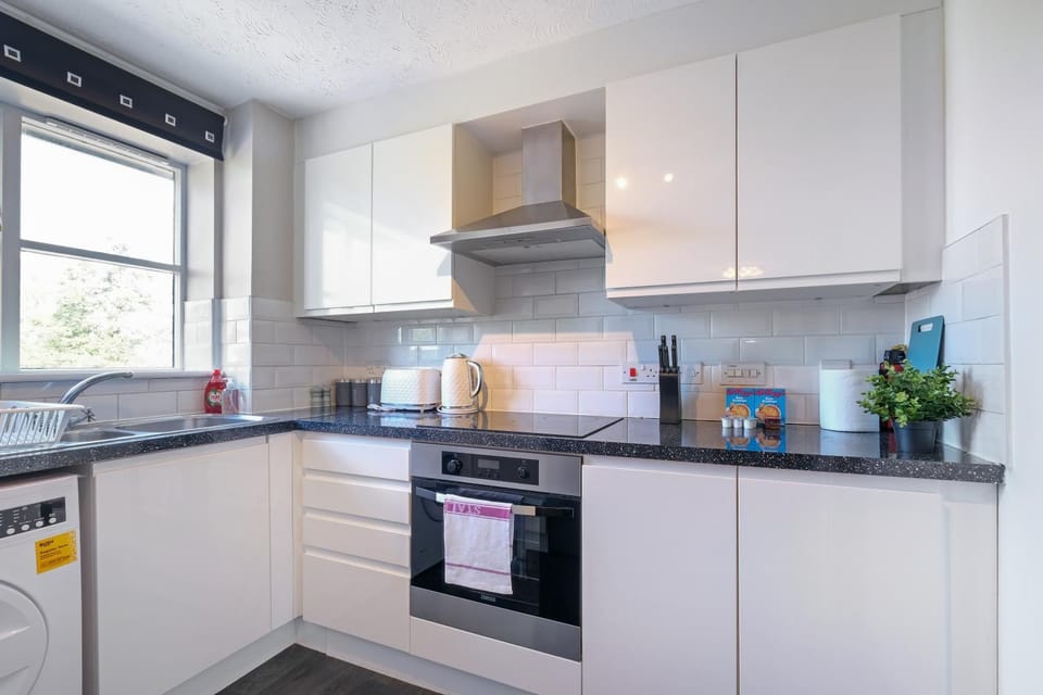 Kitchen or kitchenette, stove, toaster