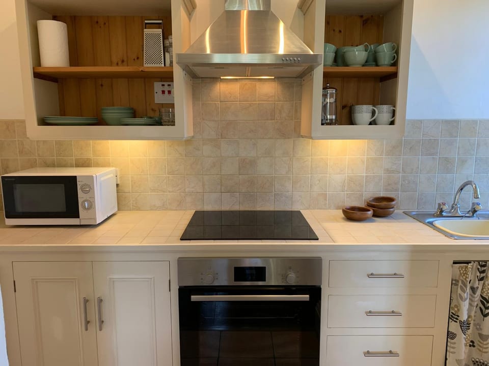 Kitchen or kitchenette, stove