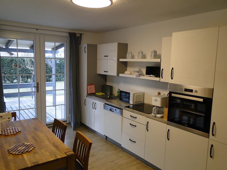 Kitchen or kitchenette, Dining area, dishwasher, oven, stove, toaster