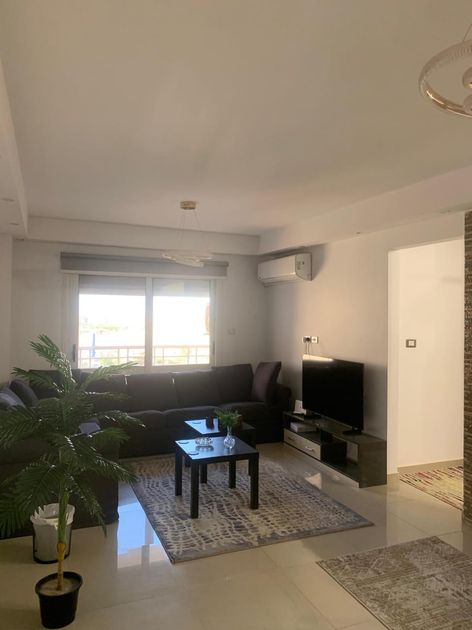 Living room, Seating area, Evening entertainment, air conditioner
