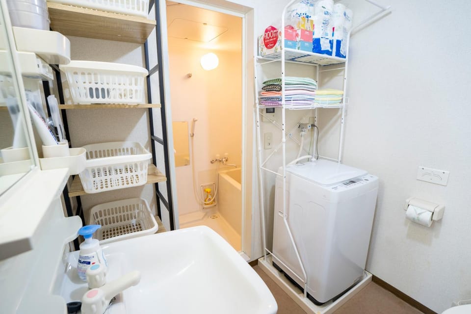 Bathroom, towels, washing machine