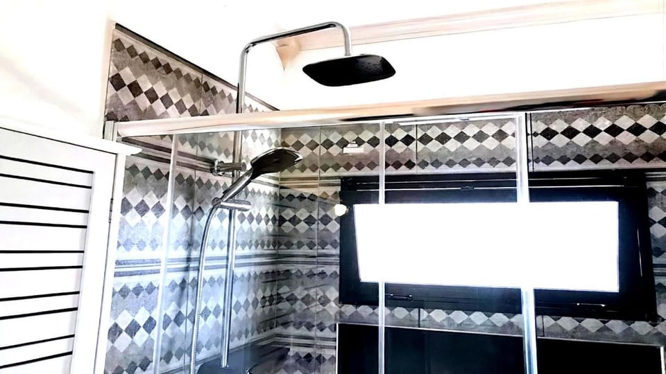 Shower, Bathroom, hair dryier, towels
