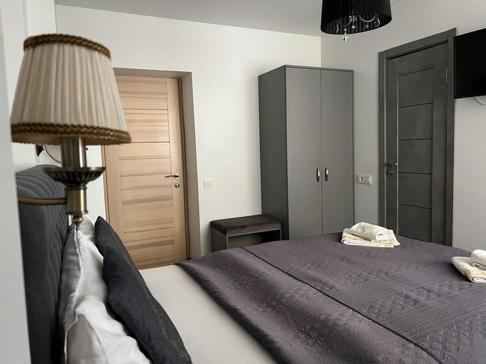 Bed, Photo of the whole room, Bedroom, towels, wardrobe