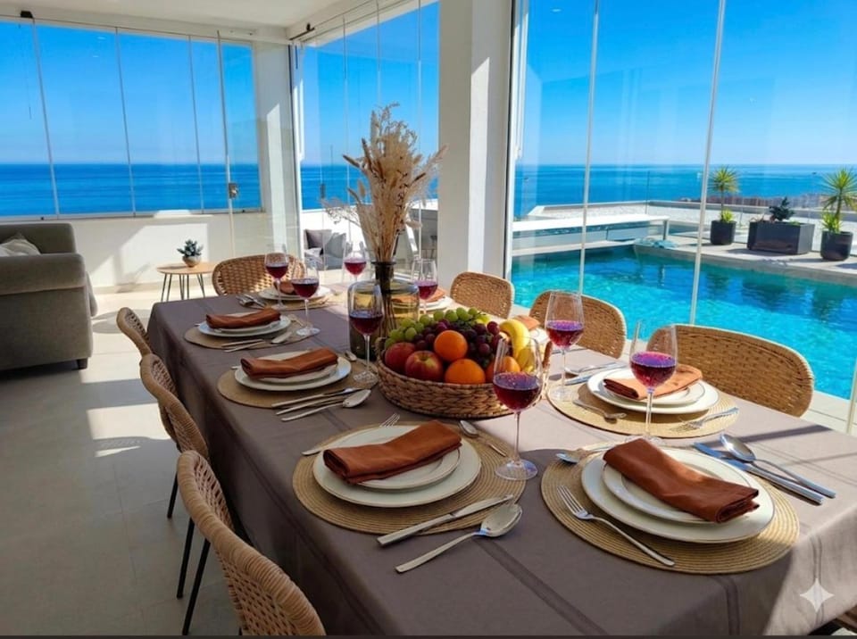 Natural landscape, Dining area, Pool view, Sea view, Swimming pool
