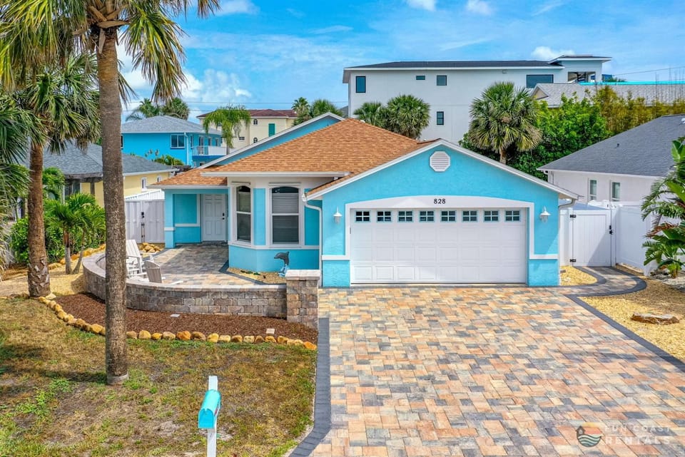 Dog Friendly and STEPS from the Ocean! Big Beach House with Pool, BBQ & Garage House in New Smyrna Beach