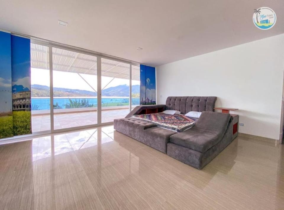 Bed, Natural landscape, Living room, Decorative detail, Bedroom, Lake view