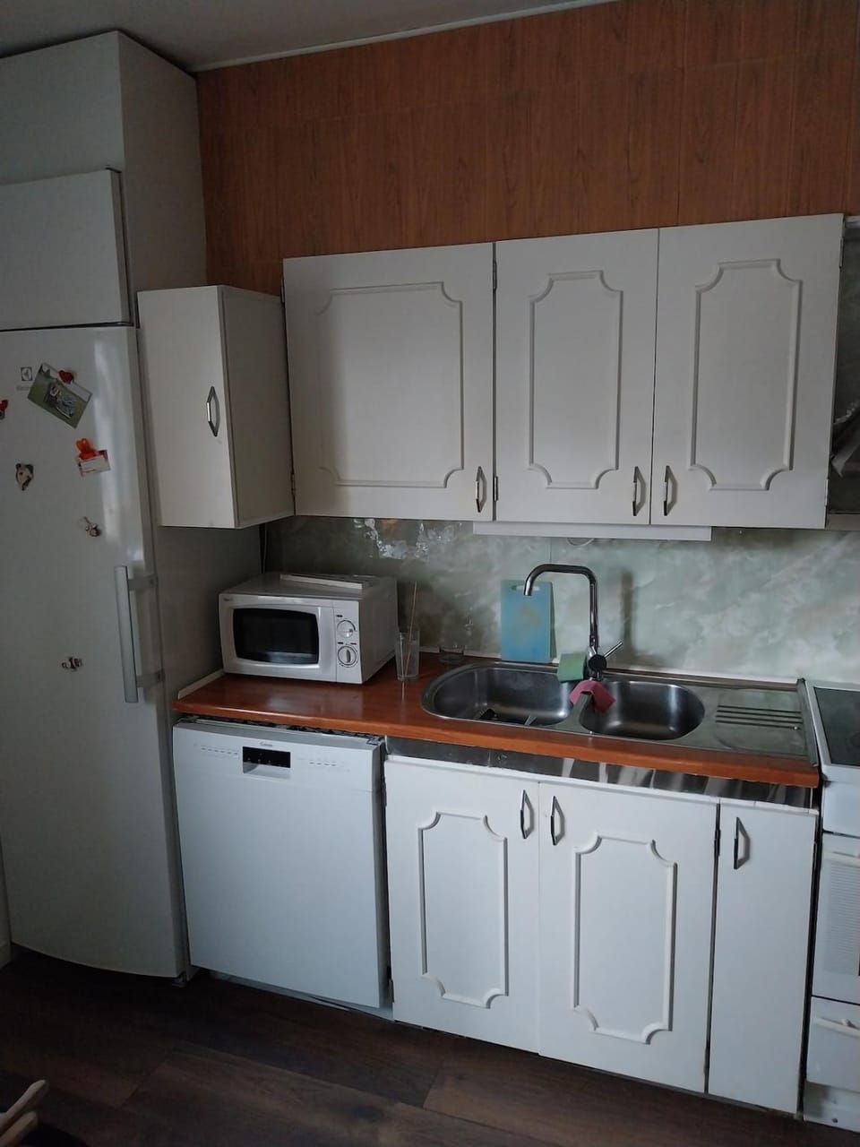 Kitchen or kitchenette, dishwasher, oven, stove