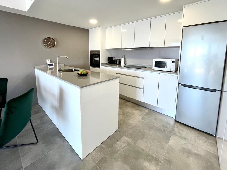 Kitchen or kitchenette, oven, stove, toaster