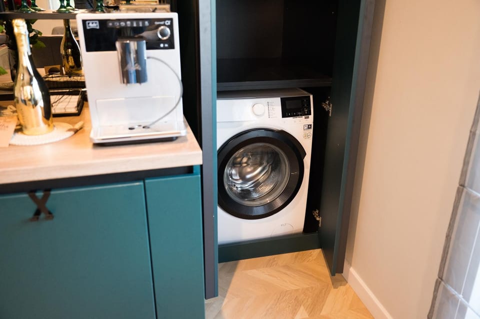 Kitchen or kitchenette, washing machine