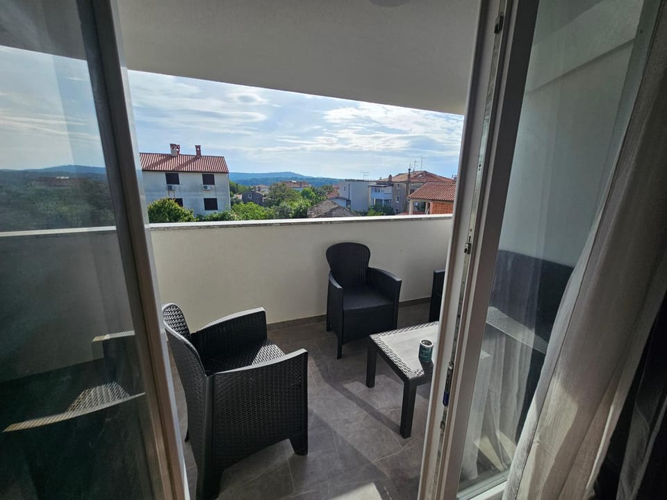 View (from property/room), Balcony/Terrace, Seating area