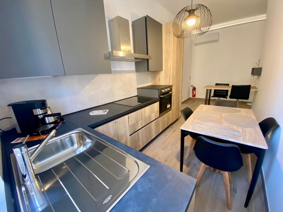 Kitchen or kitchenette, Dining area, dishwasher, oven, stove, air conditioner