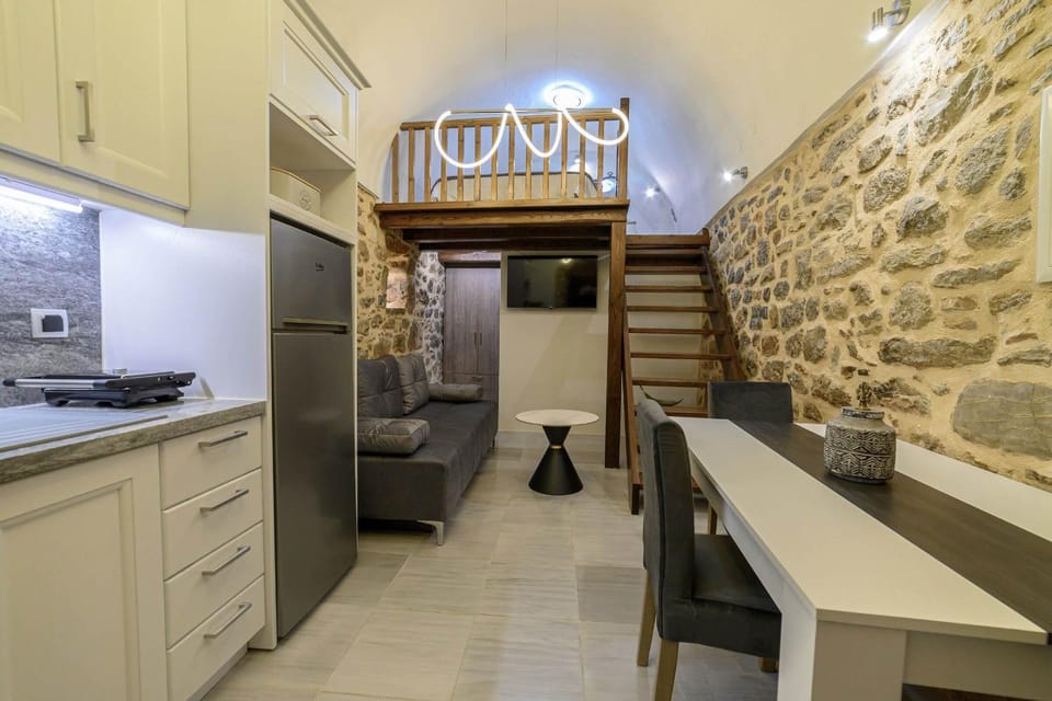 TV and multimedia, Kitchen or kitchenette, Living room, Photo of the whole room, Seating area, Dining area