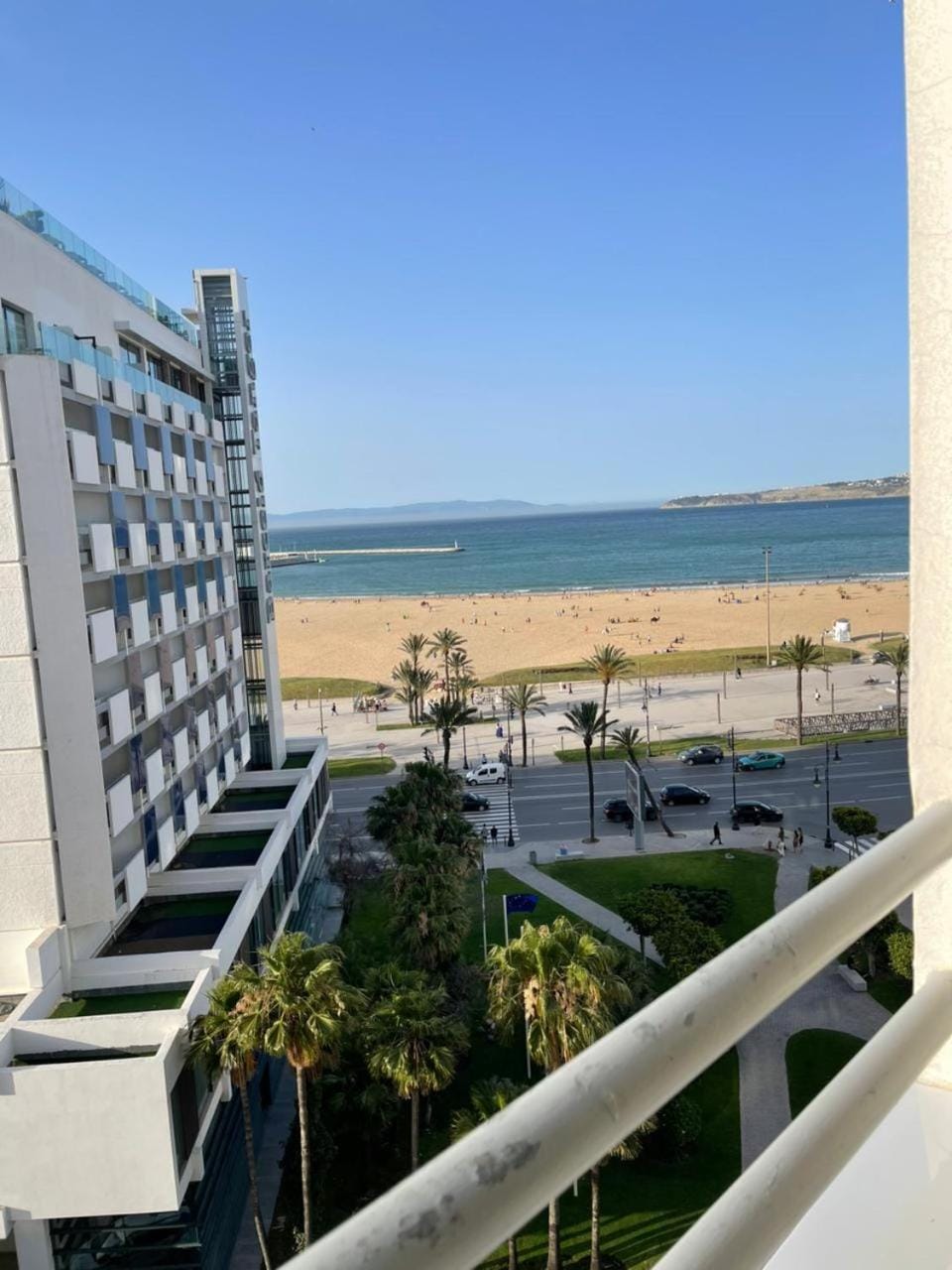 Property building, Nearby landmark, Day, Natural landscape, Beach, City view, Sea view