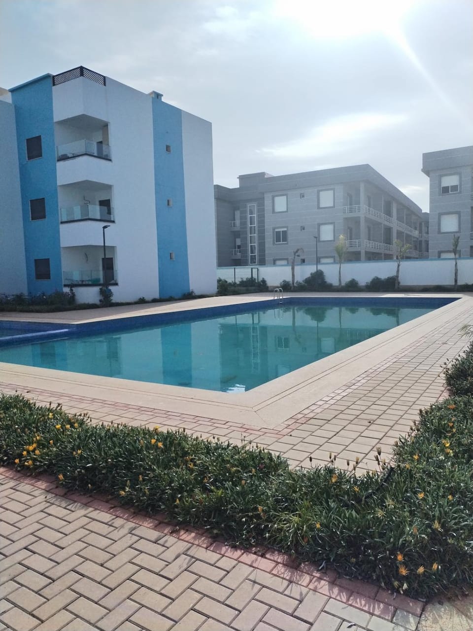 Property building, Day, Pool view, Swimming pool