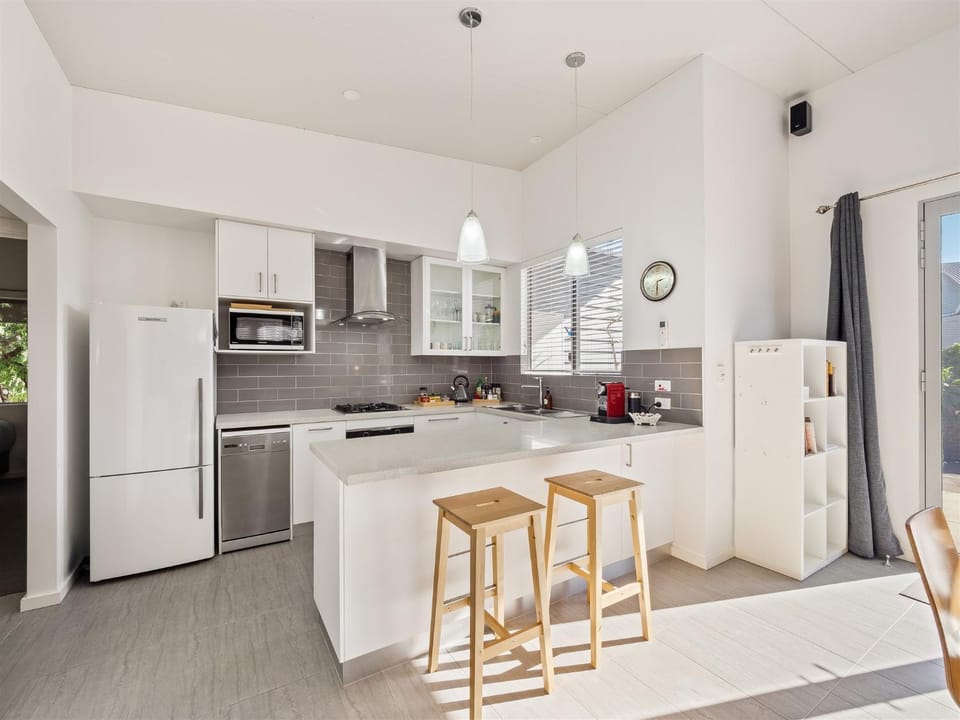 Kitchen or kitchenette, dishwasher, oven, stove, toaster