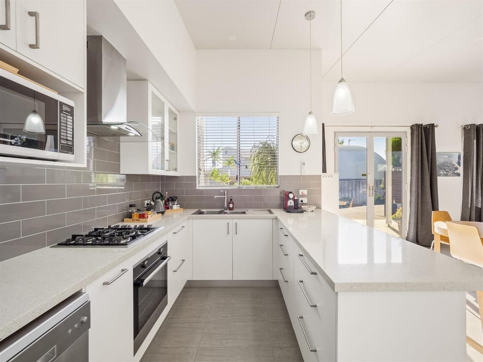 Kitchen or kitchenette, dishwasher, oven, stove, toaster