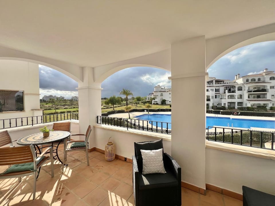 Balcony/Terrace, Seating area, Pool view, Swimming pool