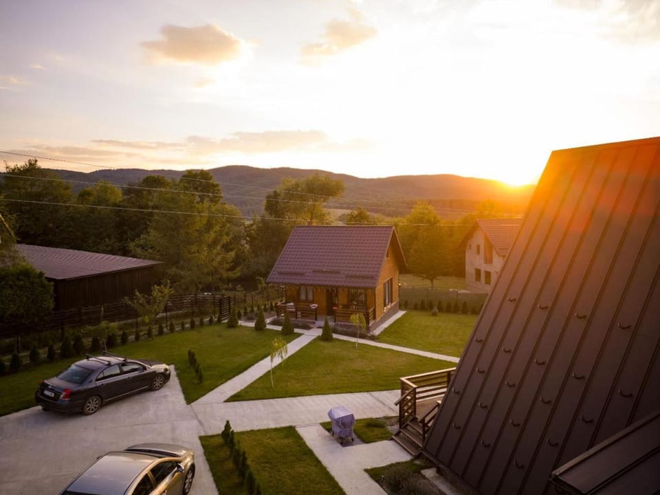 Property building, Natural landscape, Sunset, Parking