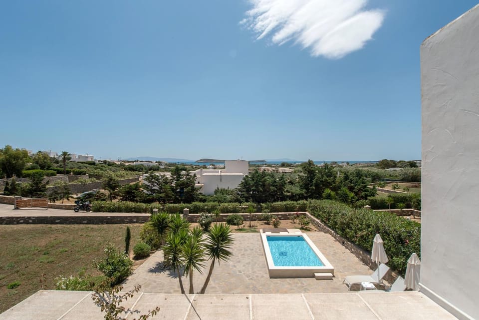 Property building, Living room, Swimming pool