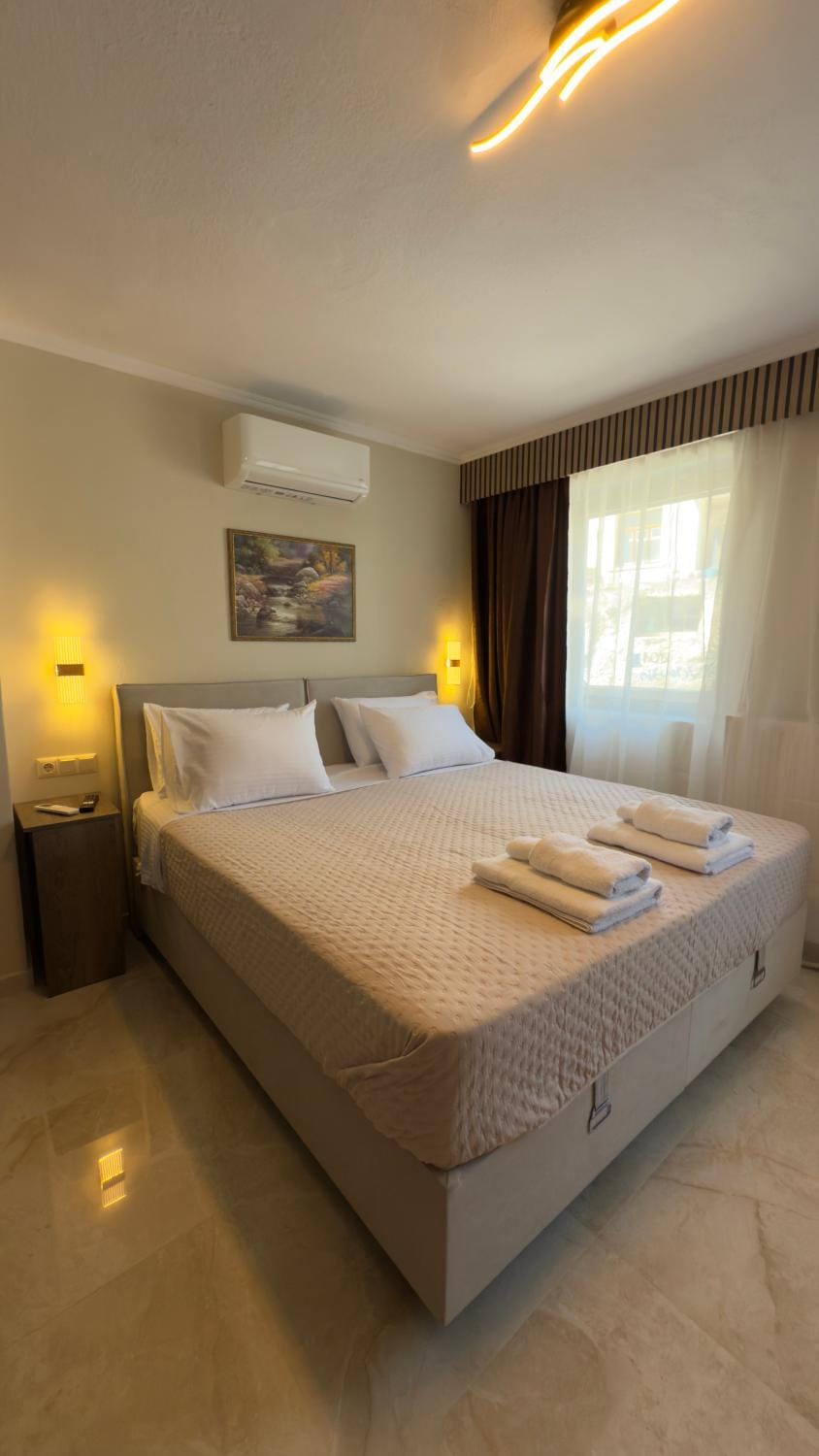 Bed, Photo of the whole room, Bedroom, towels, air conditioner