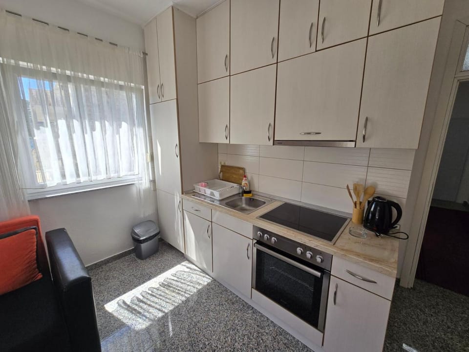 Kitchen or kitchenette, oven, stove