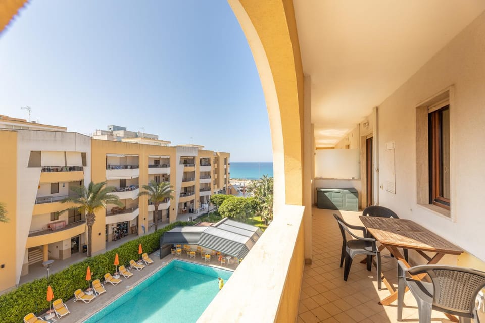 Property building, View (from property/room), Balcony/Terrace, Swimming pool