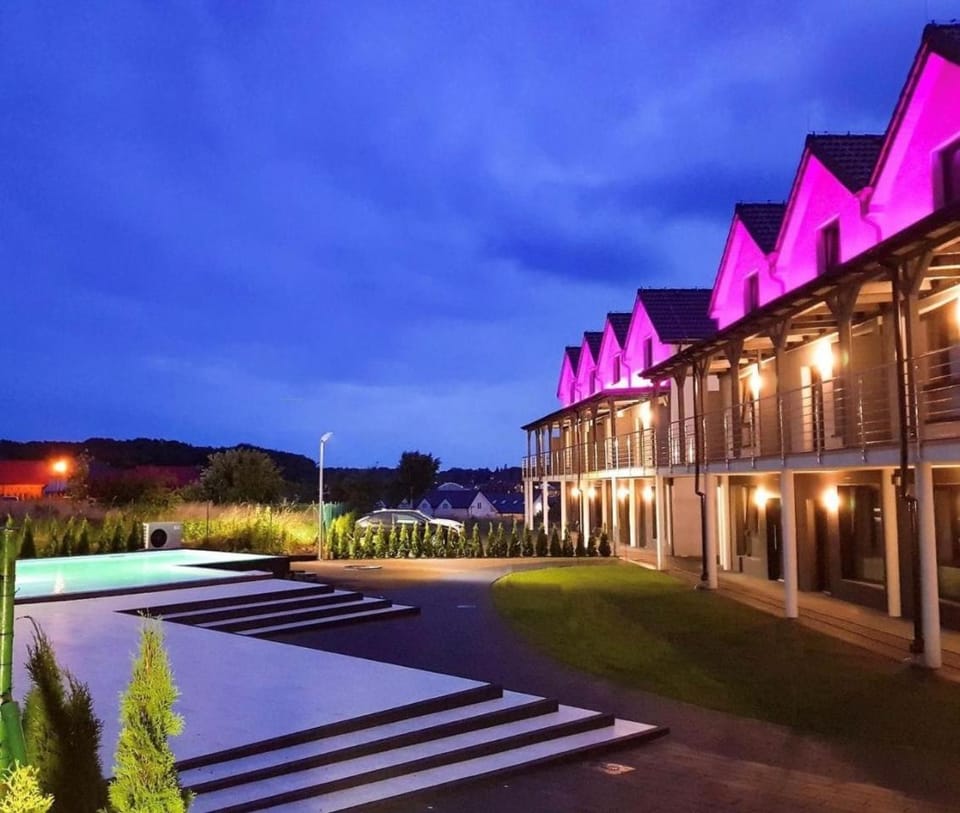 Property building, Night, Pool view, Swimming pool