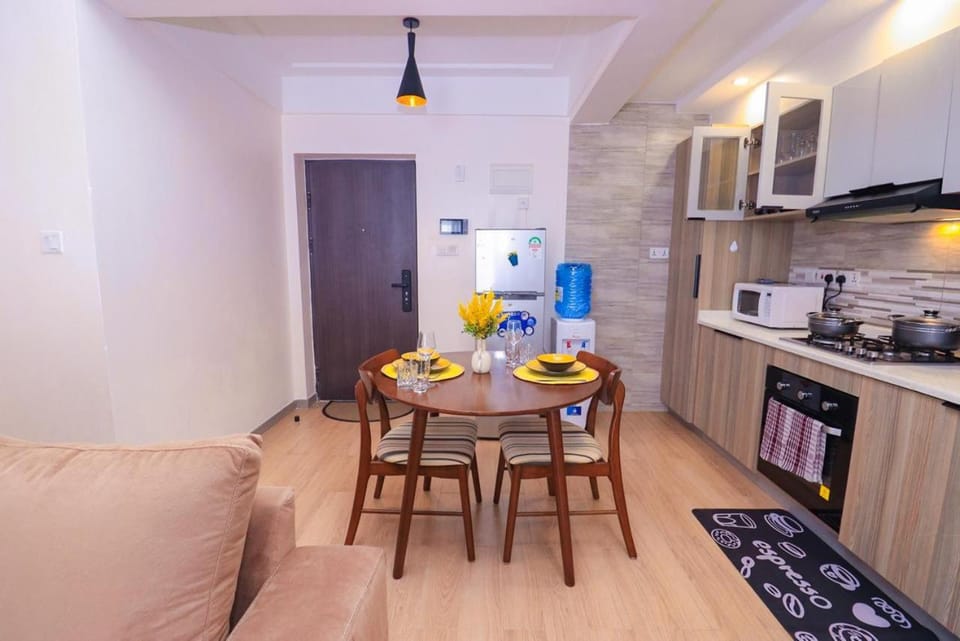 newly furnished two bedroom apartment with swimming pool, fully equipped gym, private parking space ,children playground and unbeatable scenic city views Apartment in Nairobi