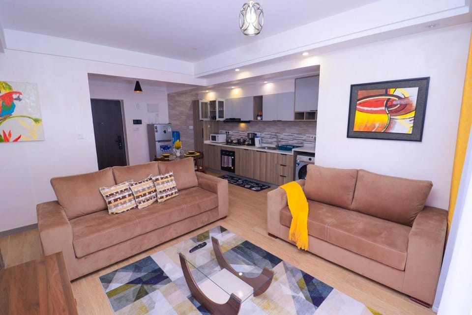 newly furnished two bedroom apartment with swimming pool, fully equipped gym, private parking space ,children playground and unbeatable scenic city views Apartment in Nairobi