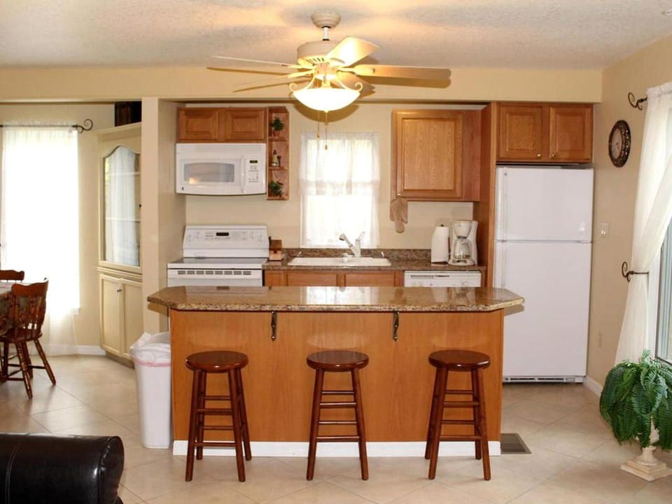 A-Frame Cabin Rental with Spacious Deck Overlooking the Cotee River, Florida Cabin in New Port Richey