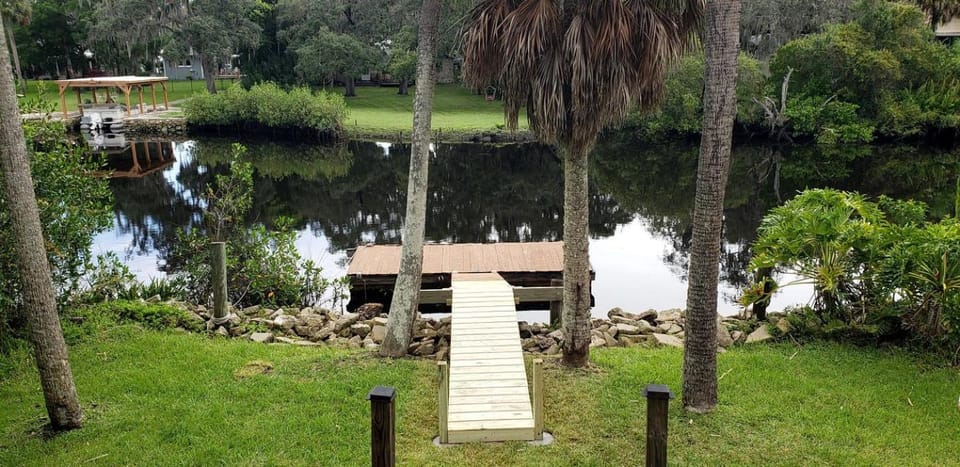 A-Frame Cabin Rental with Spacious Deck Overlooking the Cotee River, Florida Cabin in New Port Richey