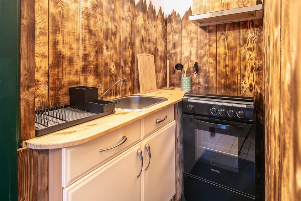 Kitchen or kitchenette, stove