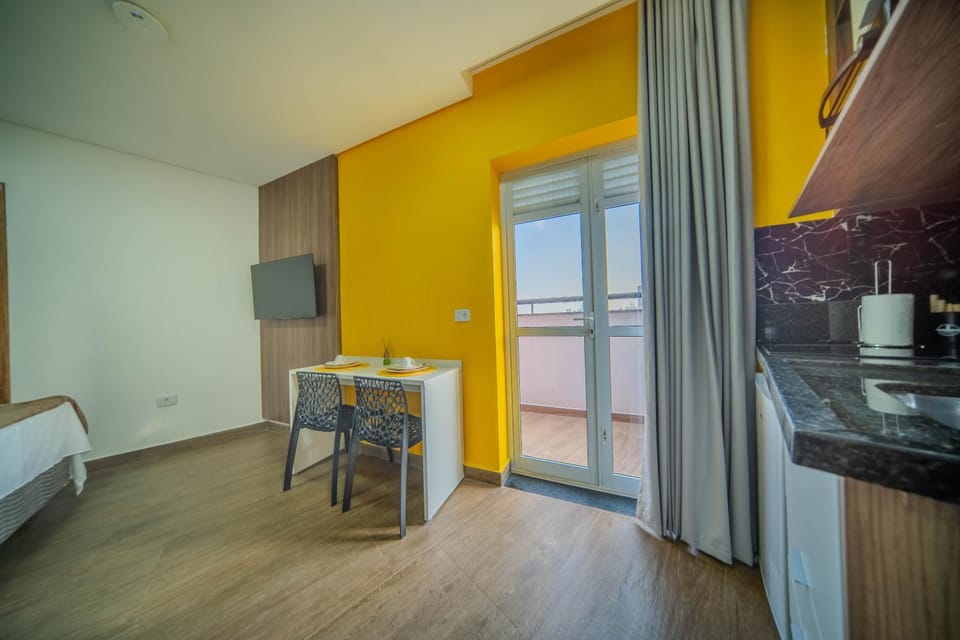 Photo of the whole room, Dining area, Bedroom, minibar, oven