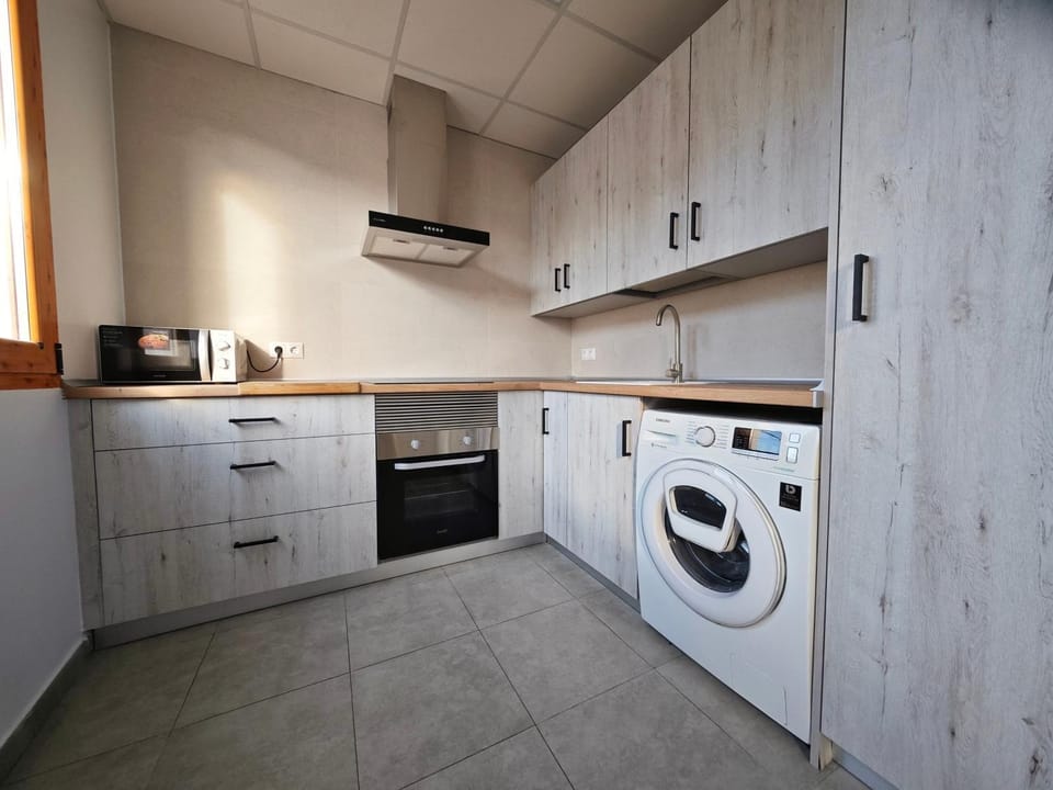 Kitchen or kitchenette, stove