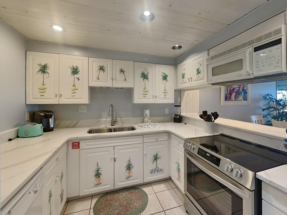 Kitchen or kitchenette, microwave, oven, stove, toaster, kitchen