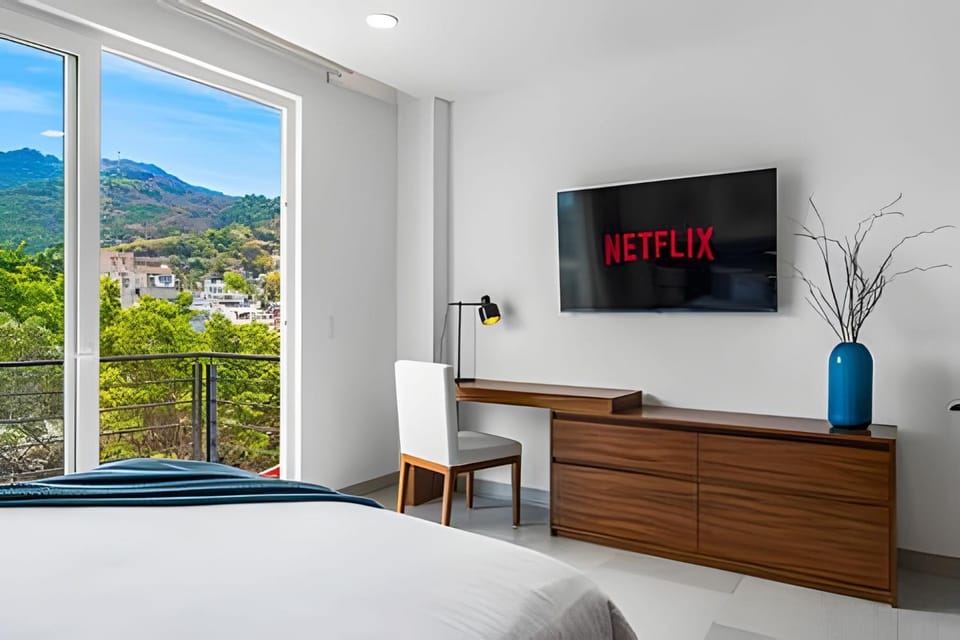 TV and multimedia, Photo of the whole room, Bedroom, Landmark view, Mountain view, Area and facilities