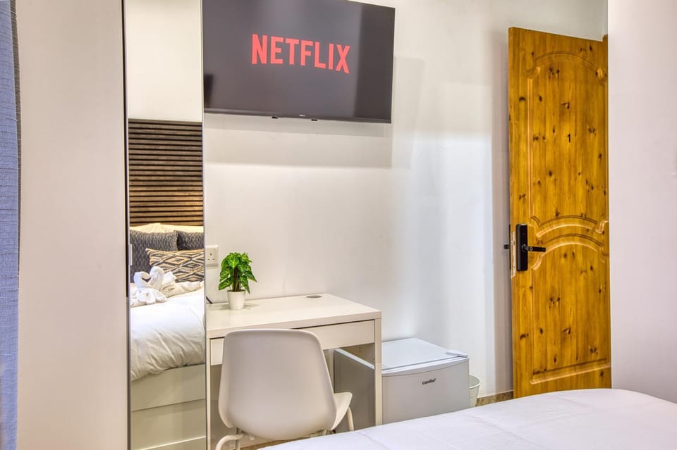 Bed, TV and multimedia, Bedroom, hair dresser, towels, wardrobe