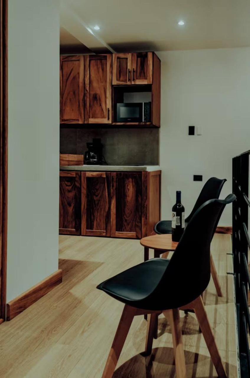 Kitchen or kitchenette, Living room, Seating area, Dining area