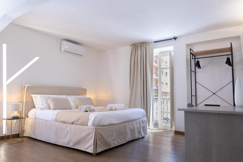 Bed, Photo of the whole room, Bedroom, towels, air conditioner