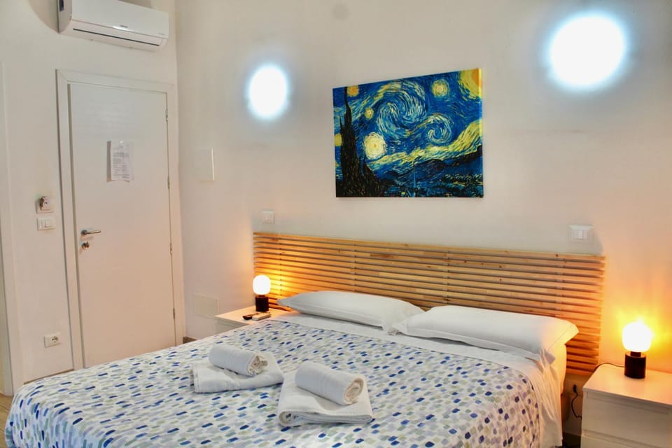 Bed, Photo of the whole room, Bedroom, towels, air conditioner